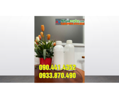 Chai nhựa 1 lít có vạch chia, chai nhựa 0.5 lít có 2 nắp đậy
